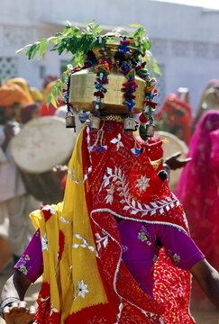 Veiled dancer at a festival in Nalu Village, Rajasthan.