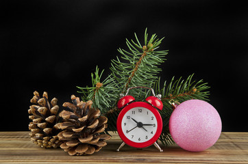 Fototapeta na wymiar watch, Christmas balls and Christmas tree branch