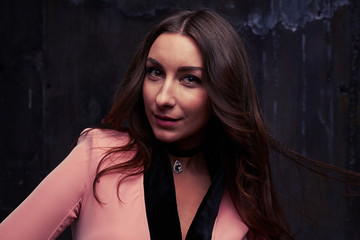 Fototapeta premium Close-up portrait of glorious brunette with evening makeup