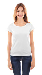 Obraz premium Young woman in blank t-shirt on white background