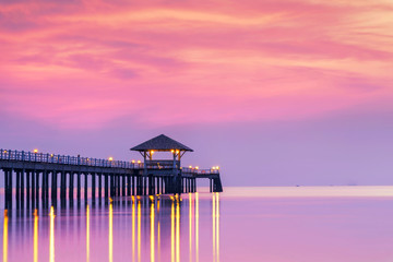 Summer, Travel, Vacation and Holiday concept - Wooden pier between sunset in Phuket, Thailand