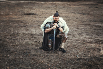 Formidable man with a sword in the sad, he had iron armor.