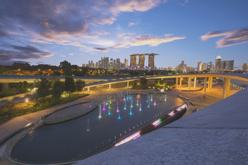 Panorama of Singapore skyline illuminated in the evening twilight..
