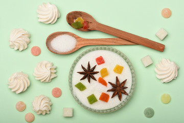 Sweets on light green background