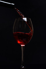 glass with red wine drops