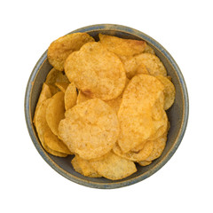 Beef barbecue flavor potato chips in an old bowl top view isolated on a white background.