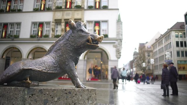 Monument of wild boar outside Hunting and Fishing Museum in Munich, Germany