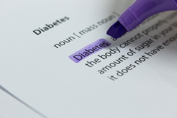 The word diabetes highlighted in violet with felt tip pen