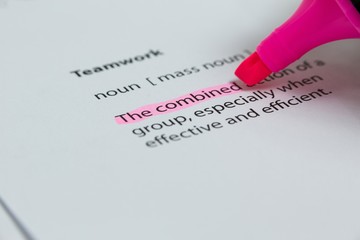 The word combined highlighted in pink with felt tip pen