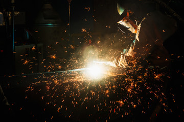 Welder arc Gouging carbon electrode rods   with sparks and smoke