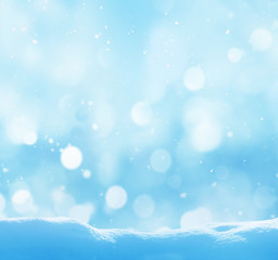 Christmas winter background with snow and blurred bokeh.Merry ch