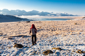 Hiker enjoying view at mountains, Tien Shan, Kyrgyzstan.