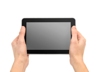 Female hands holding tablet PC with blank screen. Isolated on wh