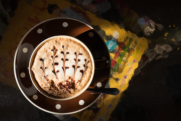 Cup of coffee on the table.