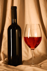 bottle of wine and glass on the table