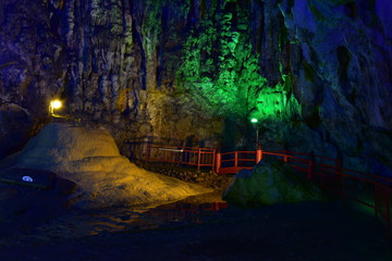 Underground cave interior with colour lighting