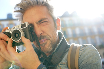 Photographer in Spain taking pictures with vintage camera