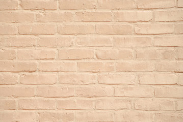 Beige grunge brick wall texture background