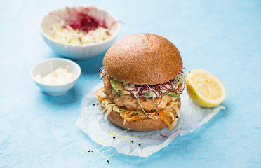 Burger with salmon and avocado