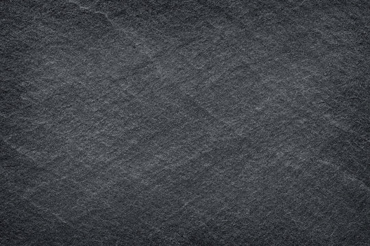 Dark grey black slate background or texture.Dark grey black slat