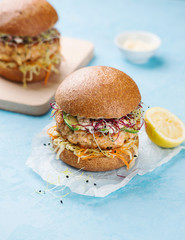 Burger with salmon and avocado