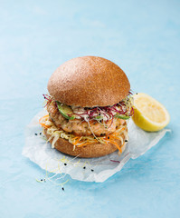 Burger with salmon and avocado