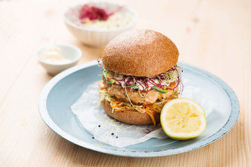 Burger with salmon and avocado