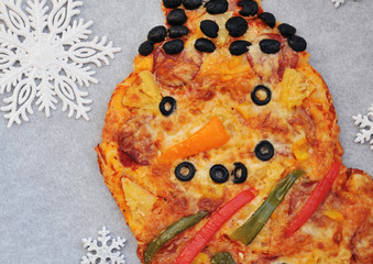 Christmas snowman pizza - easy, healthy and delicious fun food party treats for kids top view blank space for text