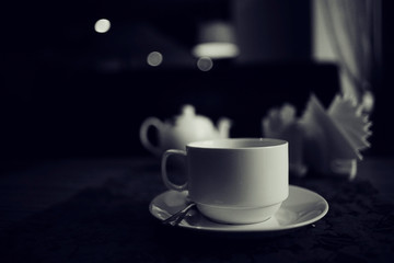teapot and cup of tea at a cafe