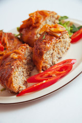 fish cutlets with tomato sauce