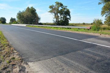 Laying and repair new asphalt road.