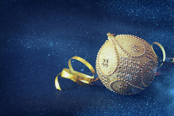 Image of christmas festive tree gold ball decoration