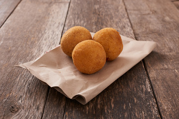 Arancini (deep fried rice balls with meat) Typical Sicilian street food