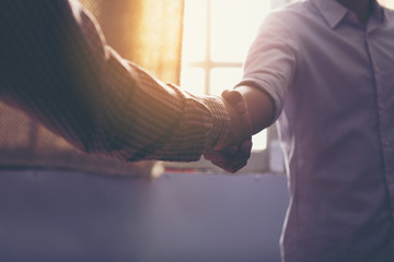 Business people shaking hands, finishing up a meeting