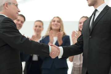 Handshake between competitors before the start of business negot