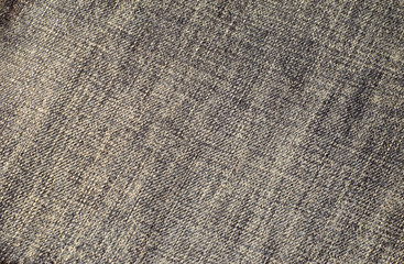 Texture of a blue jeans.  Fabric background