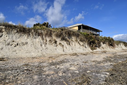 Beach erosion caused by Hurricane Matthew hitting along the east coast of Florida