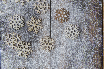Snowflakes on the wooden table