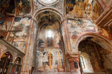 Fototapeta na wymiar Historical hall of medieval church in the ancient Orthodox monastery Gelati with fresco, built in 12th century, Georgia