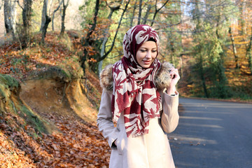 beautiful young muslim women posing at nature