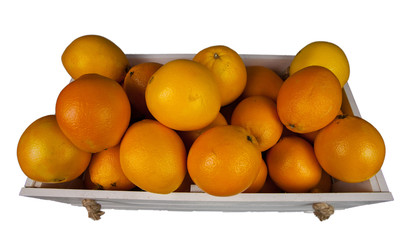 Ripe oranges in a white wooden box, on white background, isolated