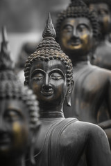 Row of Buddha statues at Ganagarama temple, Colombo, Sri Lanka.