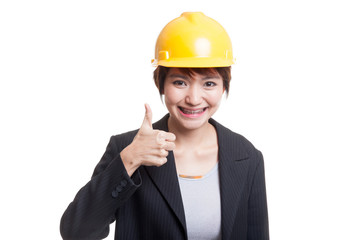 Asian engineer woman show thumbs up.