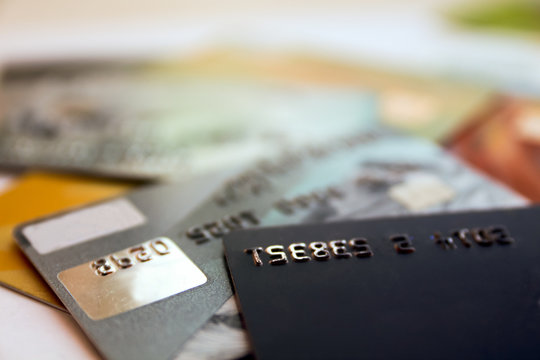 stack of credit cards, close-up view. background with copy space