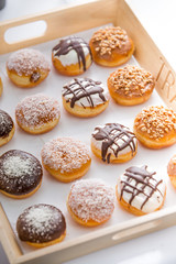 delicious Doughnuts / donuts on a tray restaurant menu day time 