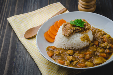 Tonkatsu, Japanese Curry Rice with deep-fried pork cutlet on woo