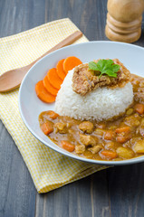 Tonkatsu, Japanese Curry Rice with deep-fried pork cutlet on woo
