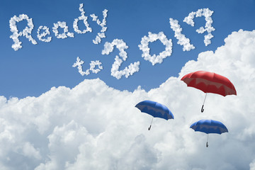 many umbrella floating above against Blue sky and cloud.Sunny day.Cloudscape.close up the cloud.text ready to 2017.end of the 2016 year concept.get ready to better life in new year 2017 concept
