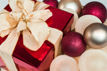 Christmas gift box and baubles