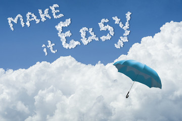 blue umbrella floating above against Blue sky and cloud.Sunny day.Cloudscape.close up the...